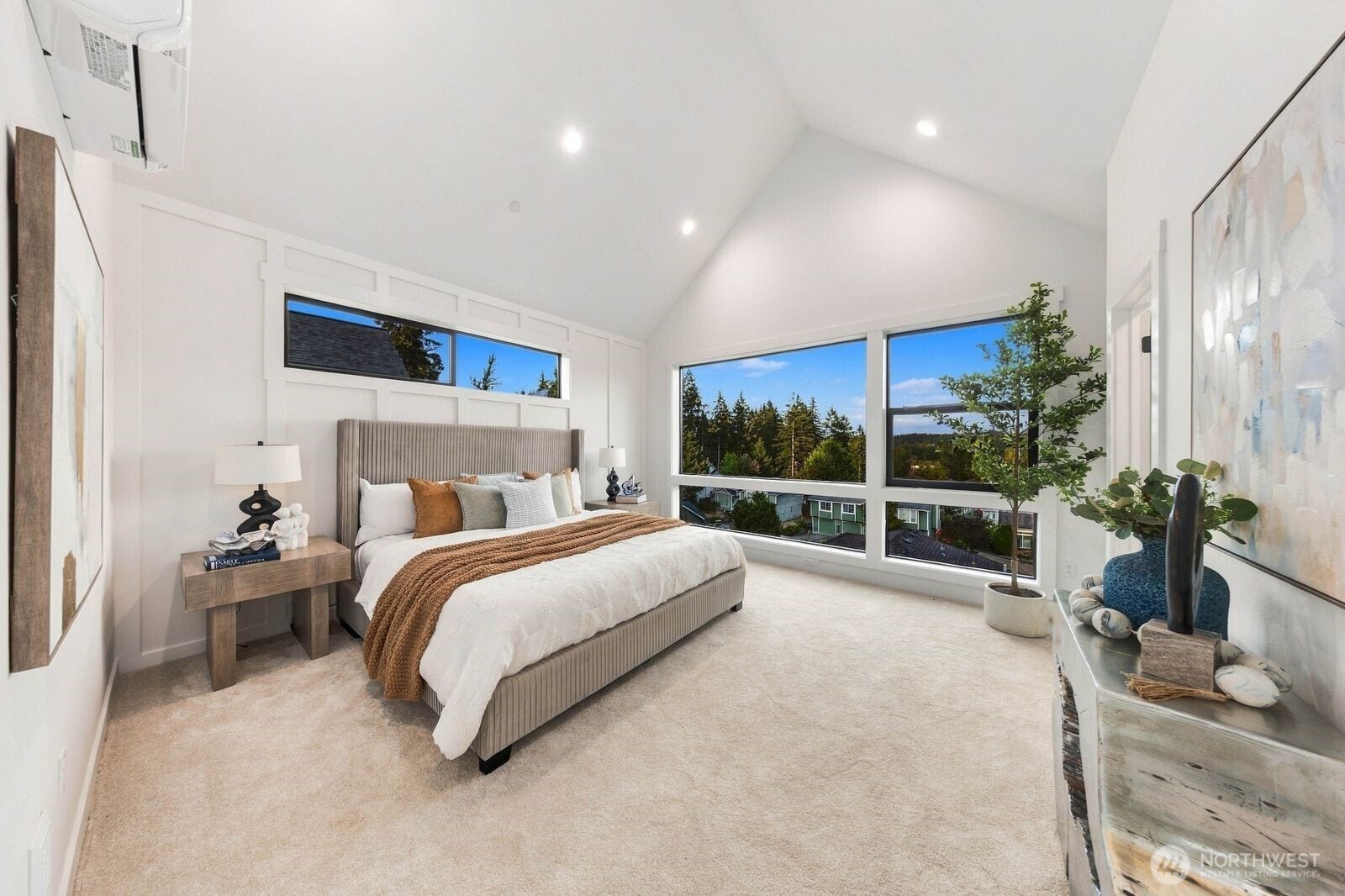 932 Duchess Road, #B-3, Bothell, WA 98012 Spacious primary suite surrounded by expansive windows, filling the room with beautiful natural light.