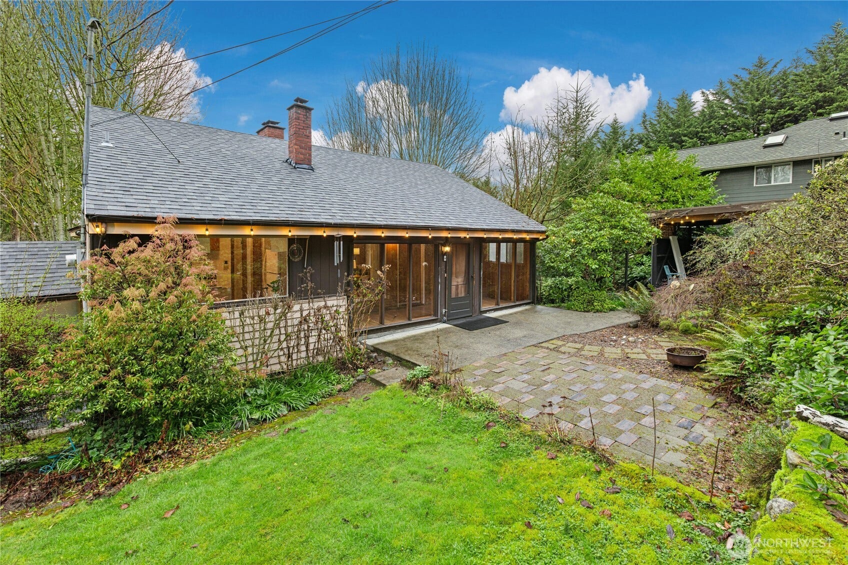 6526 NE 198th Street, Kenmore, WA 98028 Enjoy the patio and mature landscaping in the front yard.