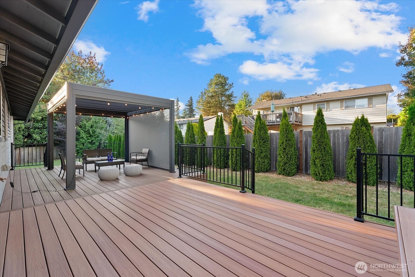 12728 NE 132nd Place, Kirkland, WA 98034 Enjoy year-round outdoor living with this beautiful pergola.
