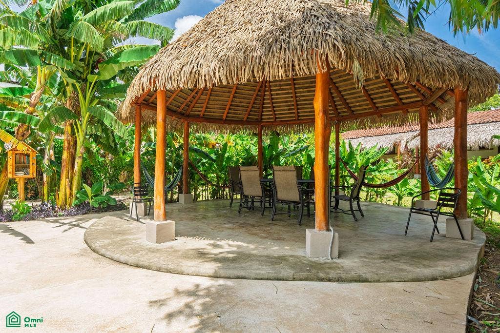 La Iguana Dorada Fully Furnished Condo - Near Playa Grande, Playa Grande, Cabo Velas, Santa Cruz, Guanacaste, Costa Rica 50309 Community rancho offering a shaded space for dining, relaxing and socializing.