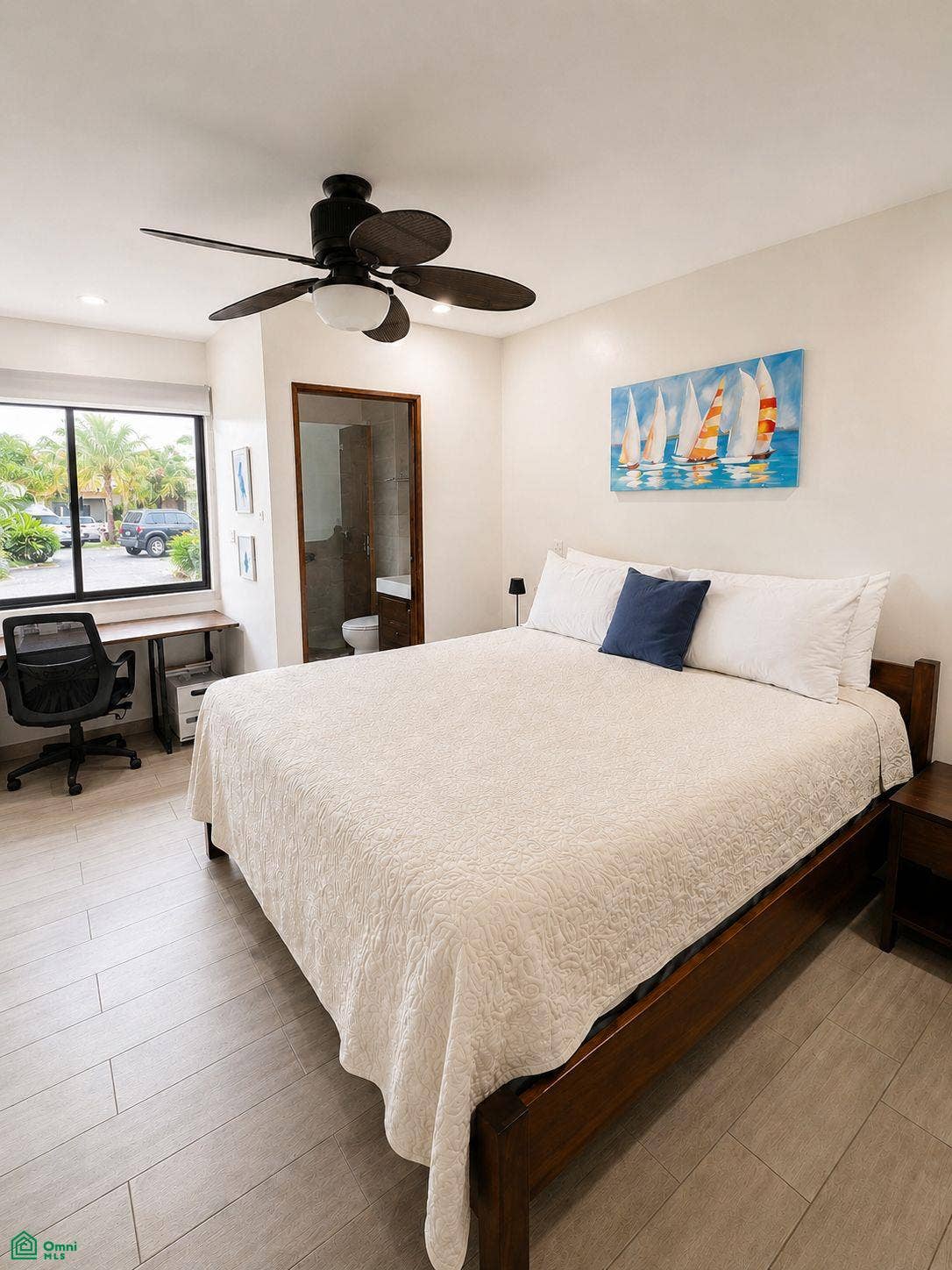 La Iguana Dorada Fully Furnished Condo - Near Playa Grande, Playa Grande, Cabo Velas, Santa Cruz, Guanacaste, Costa Rica 50309 Primary bedroom with workspace and direct access to a full bathroom.