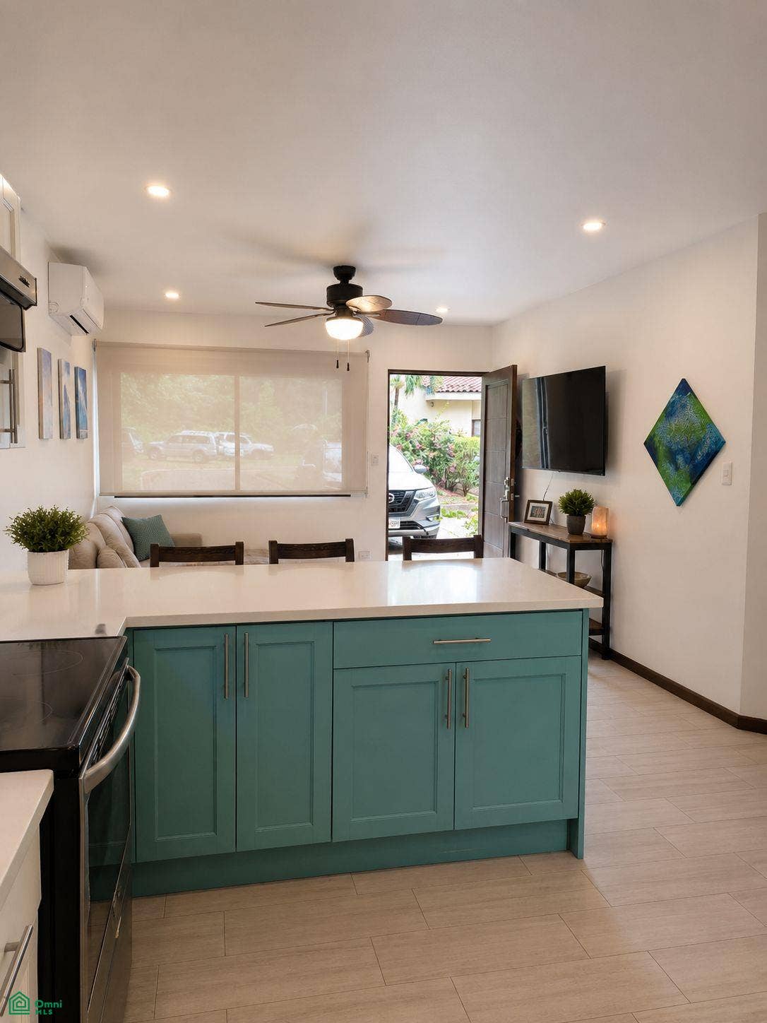 La Iguana Dorada Fully Furnished Condo - Near Playa Grande, Playa Grande, Cabo Velas, Santa Cruz, Guanacaste, Costa Rica 50309 Spacious kitchen island connecting naturally with the furnished living area.