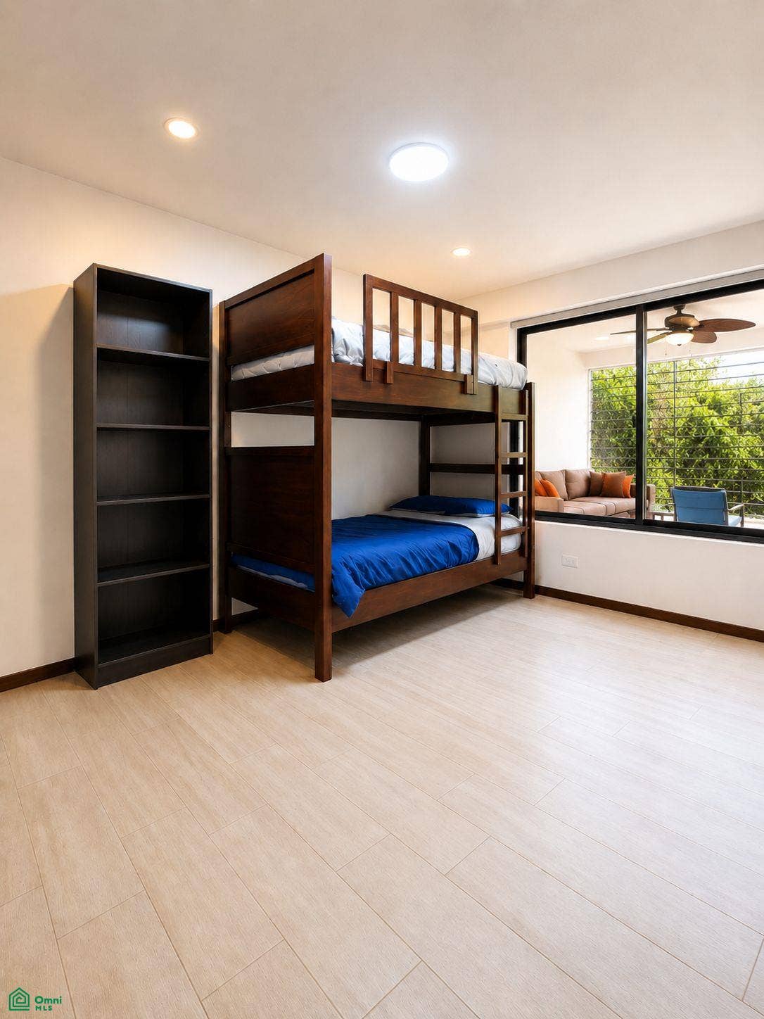 La Iguana Dorada Fully Furnished Condo - Near Playa Grande, Playa Grande, Cabo Velas, Santa Cruz, Guanacaste, Costa Rica 50309 Second bedroom with bunk beds and a view toward the enclosed flex space.