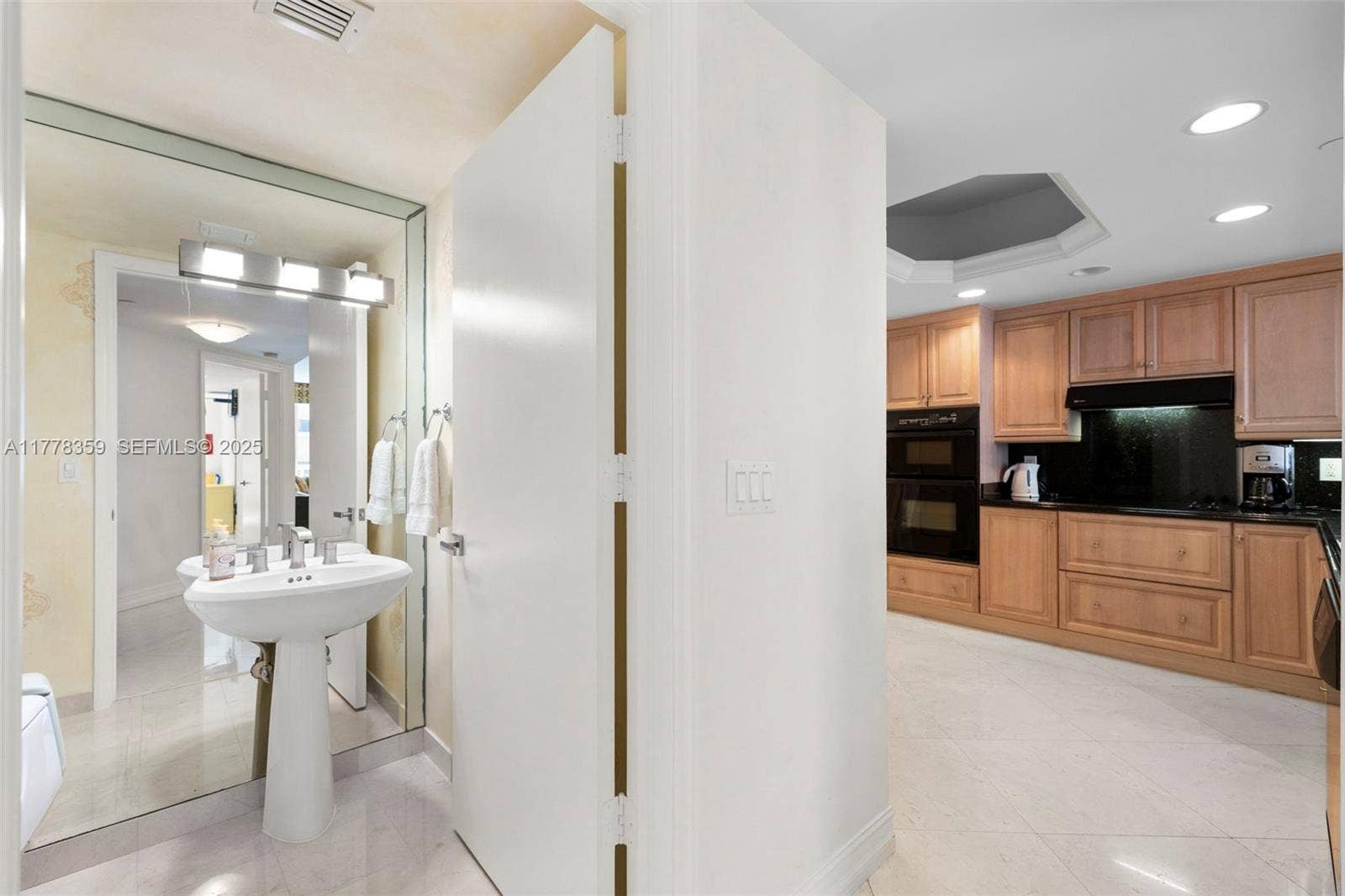 Surfside, FL 33154 powder room off the front door