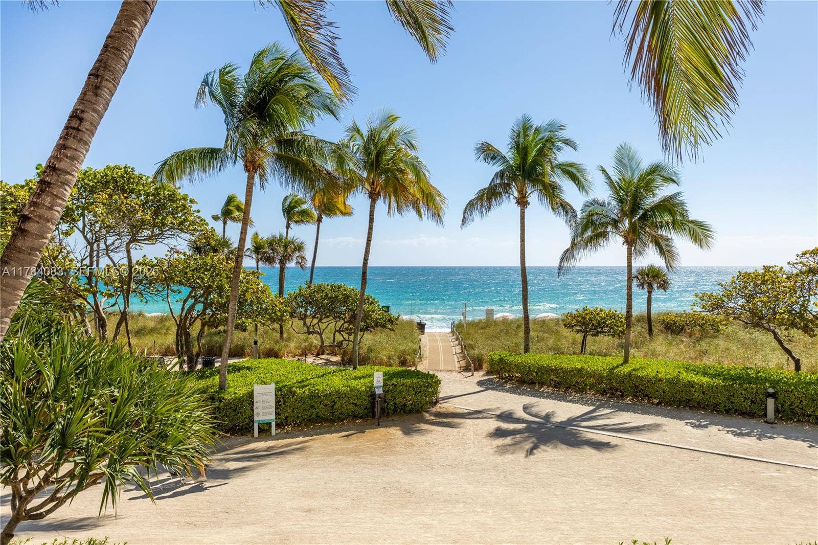 Direct beach access, with umbrella, drinks and towel service.