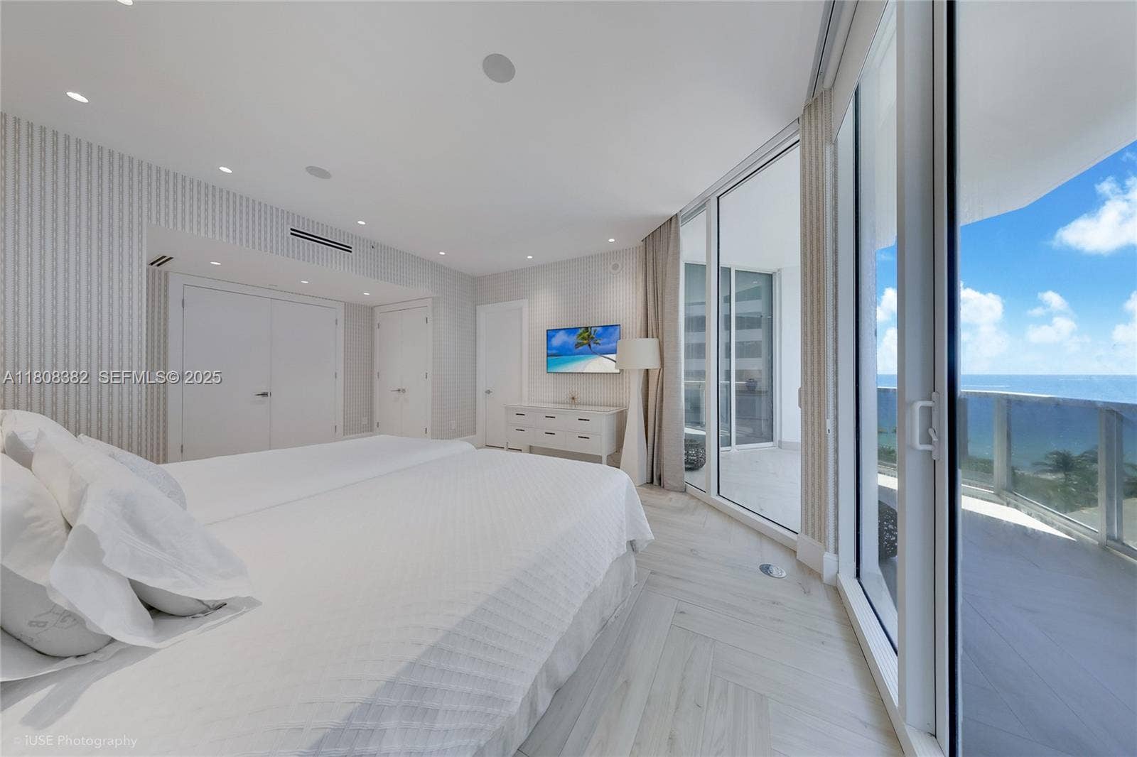 10225 Collins Avenue, #604 Renovated, Bal Harbour, FL 33154 3rd Bedroom with 2 closets, looking at the balcony, the ocean
