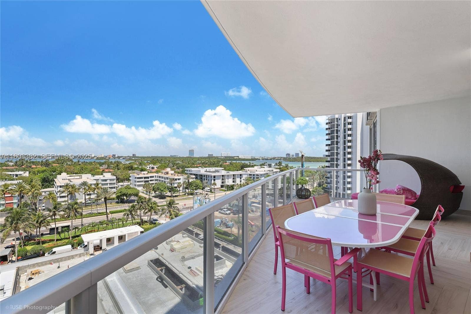 10225 Collins Avenue, #604 Renovated, Bal Harbour, FL 33154 Large balcony with space for a table and sofas, enjoying the sunsets