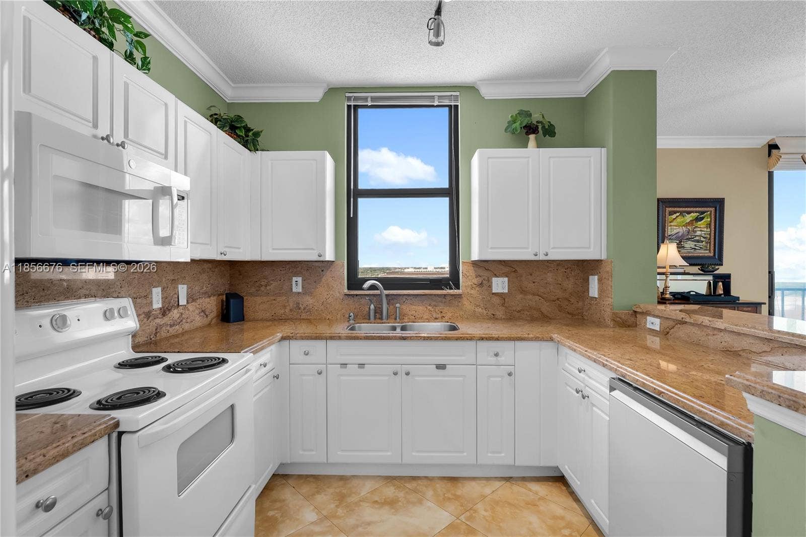 651 Okeechobee Boulevard, #1002, West Palm Beach, FL 33401 Open Kitchen with updated cabinetry and matching appliances. Washer and Dryer inside the unit as well!651 Okeechobee Blvd., Unit #1002, West Palm Beach, FL. City Place Tower Condominium. For Sale.