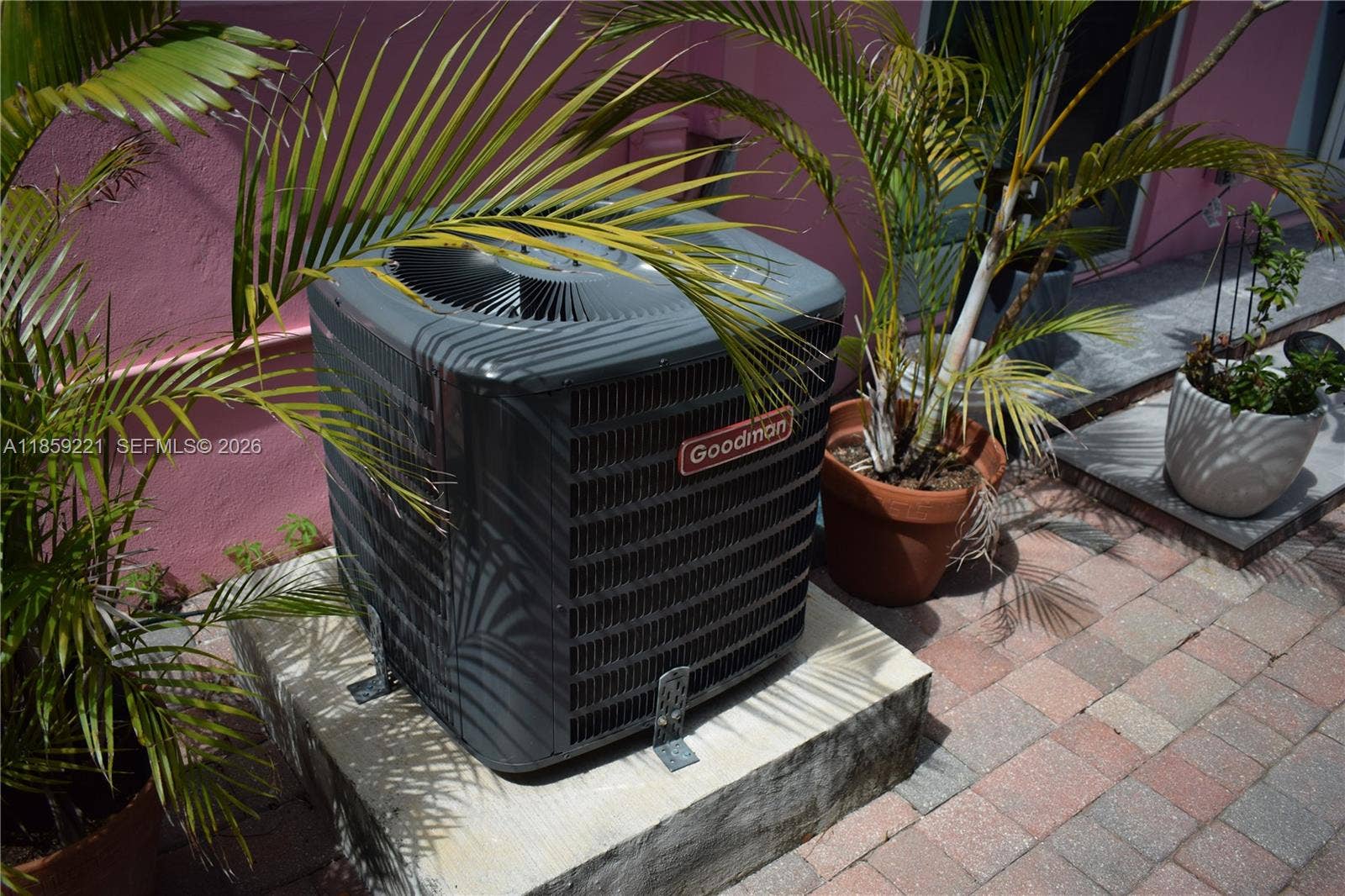 524 NE 27th Drive, Wilton Manors, FL 33334 Second A/C unit positioned on opposite side of the home, ensures enhanced cooling and energy efficiency throughout