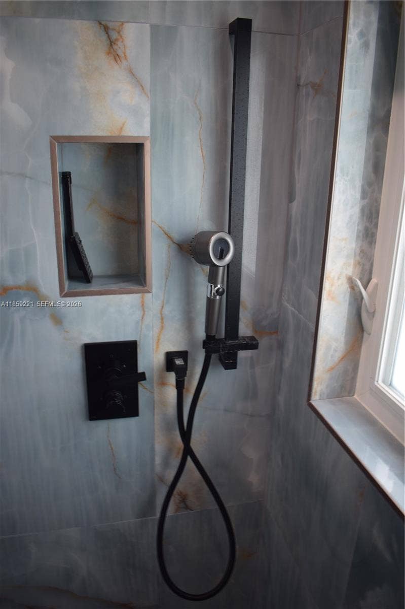 524 NE 27th Drive, Wilton Manors, FL 33334 Spa style shower for extra comfort.