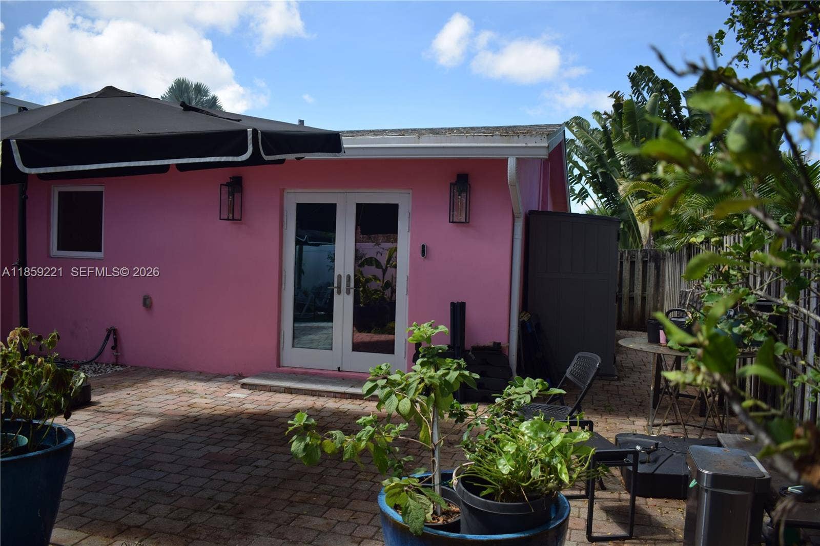 524 NE 27th Drive, Wilton Manors, FL 33334 Expansive backyard, directly accessible from spacious room.