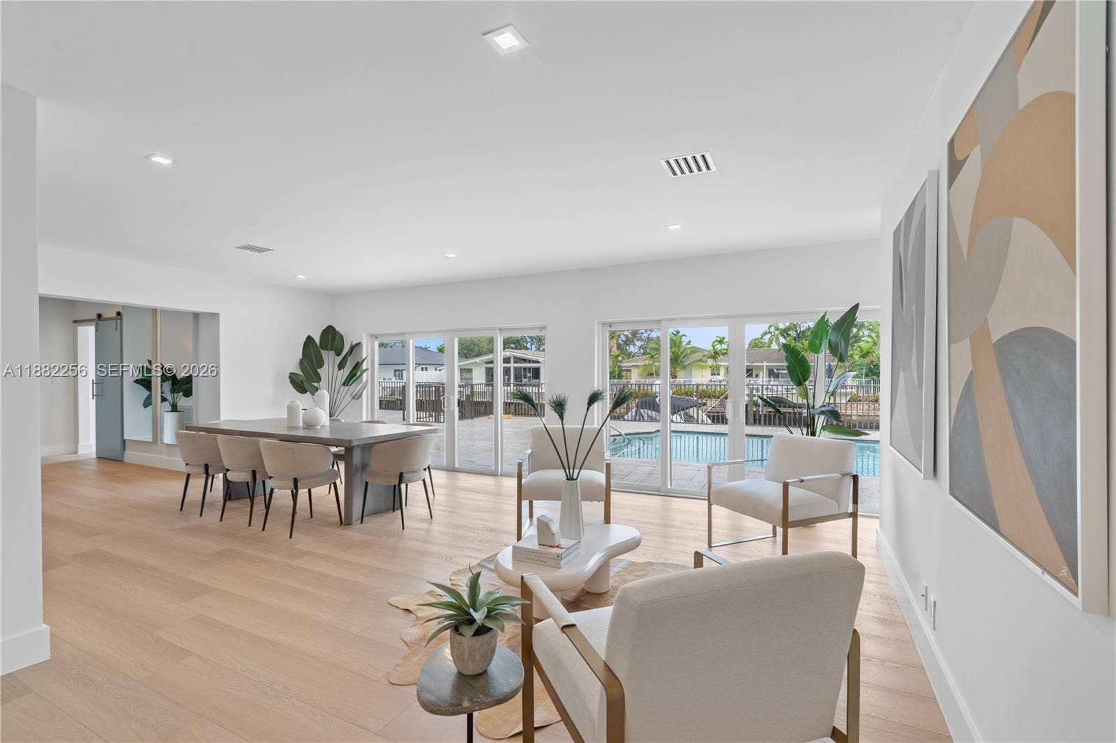 3341 NE 38th Street, Fort Lauderdale, FL 33308 2025 extensive renovation with upgraded layout, new flooring, new kitchen, new appliances, bathrooms, 2 new ACs among other items.