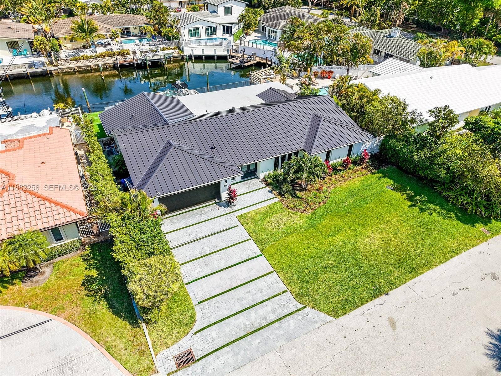 3341 NE 38th Street, Fort Lauderdale, FL 33308 New driveway and landscaping.