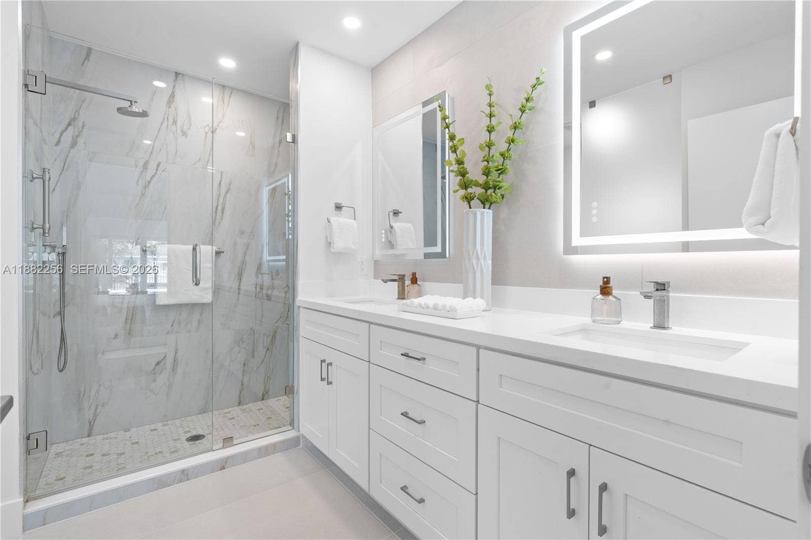 3341 NE 38th Street, Fort Lauderdale, FL 33308 Double sink and shower in primary bathroom