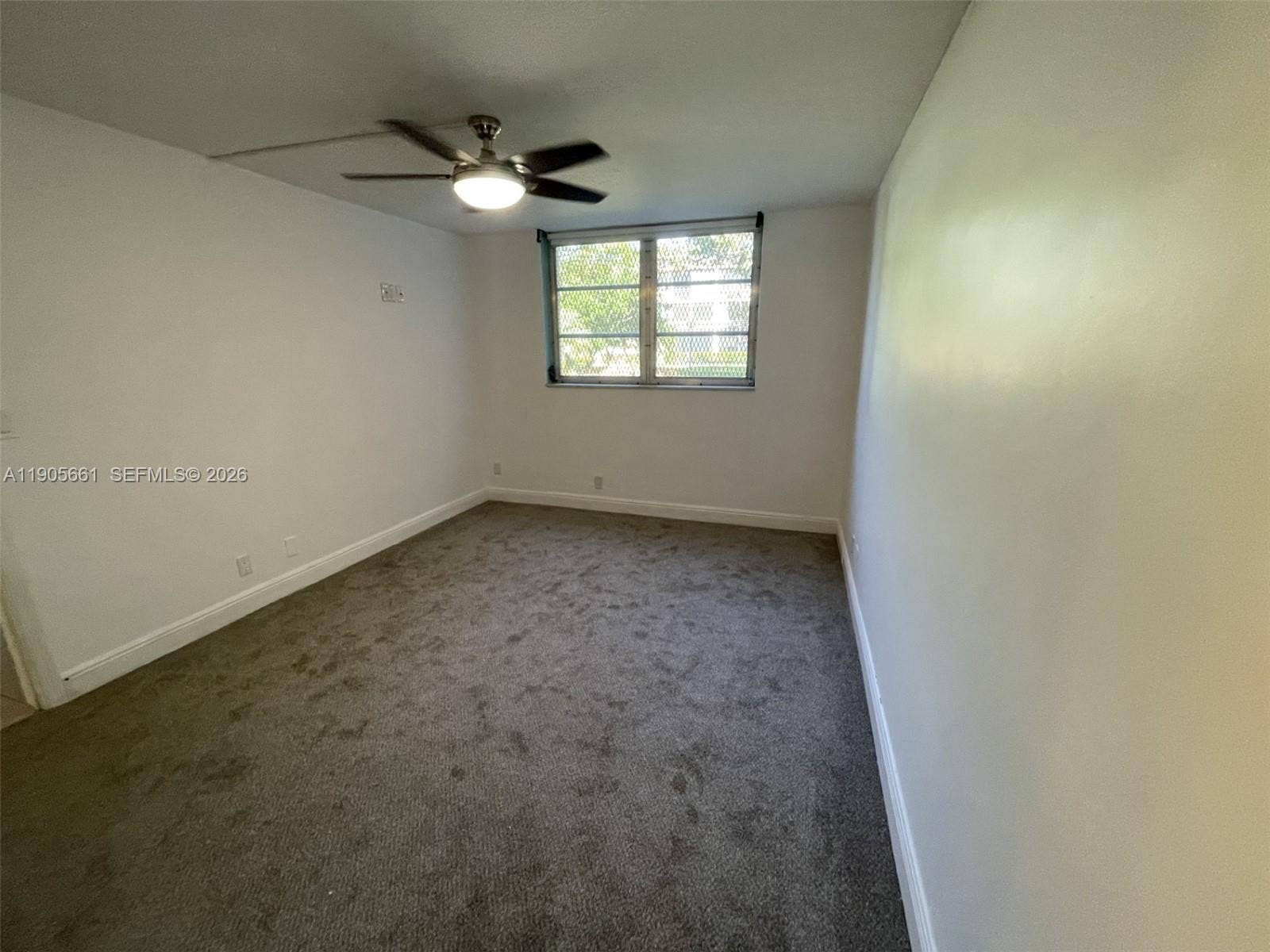Master Bedroom with Garden's View and Ceiling Fan with Dimmable Lighting.