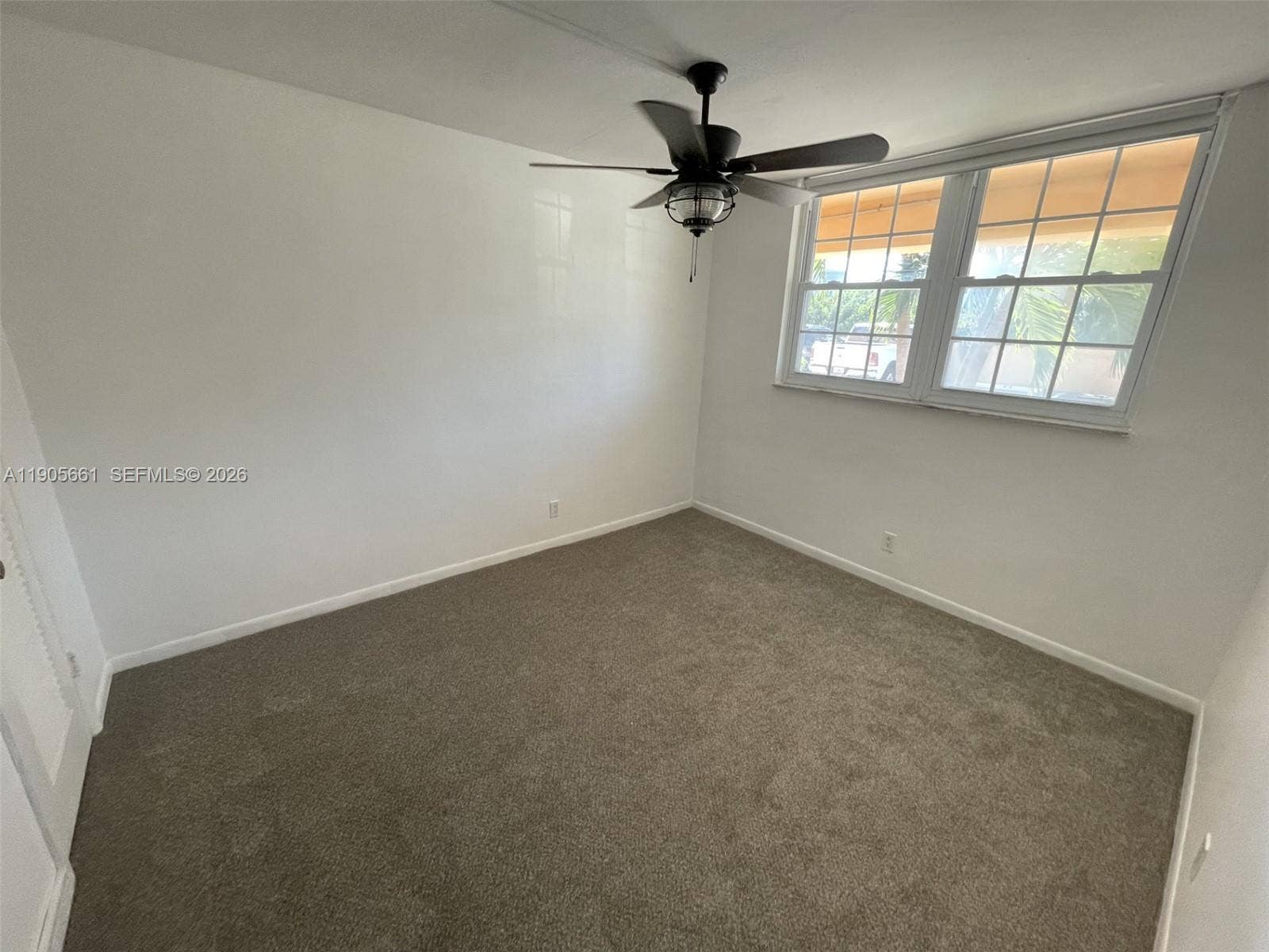 2nd Bedroom with Front's View and Ceiling Fan with Dimmable Lighting.
