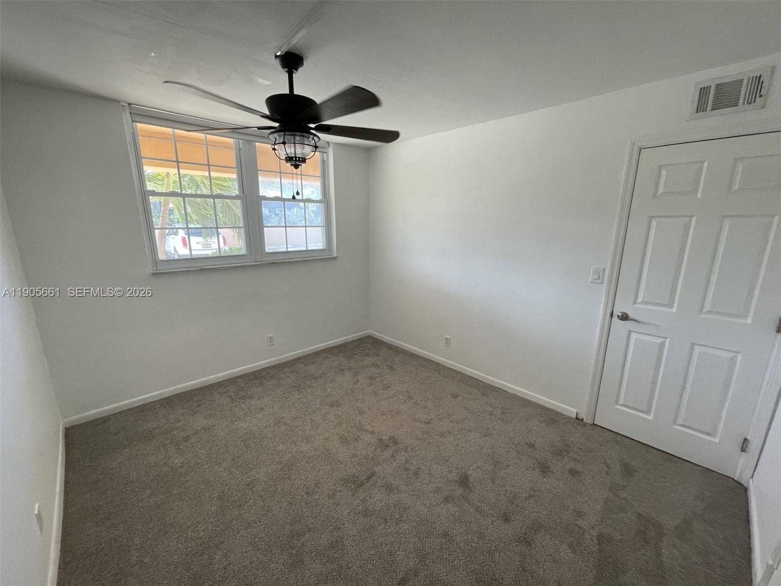2nd Bedroom with front View with Ceiling Fan with Dimmable Lighting.