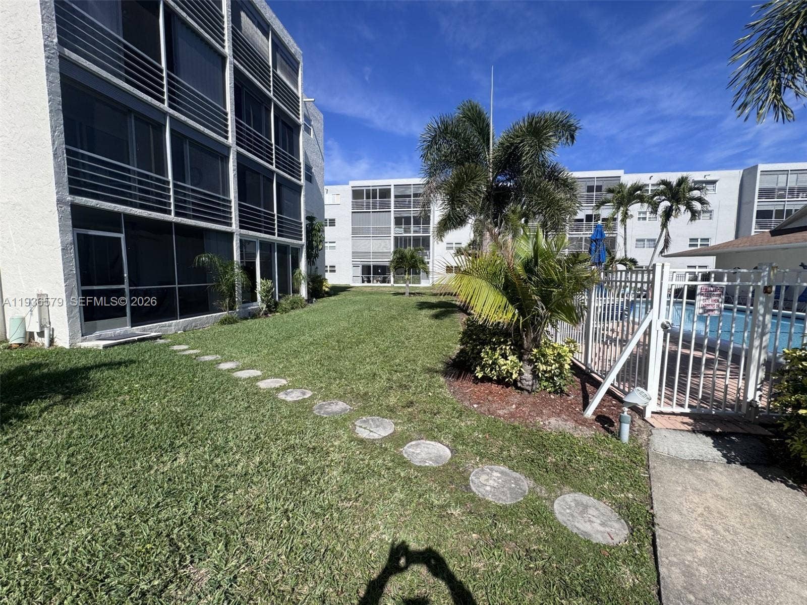 1025 SE 3rd Avenue, #102, Dania Beach, FL 33004 back door leading to pool