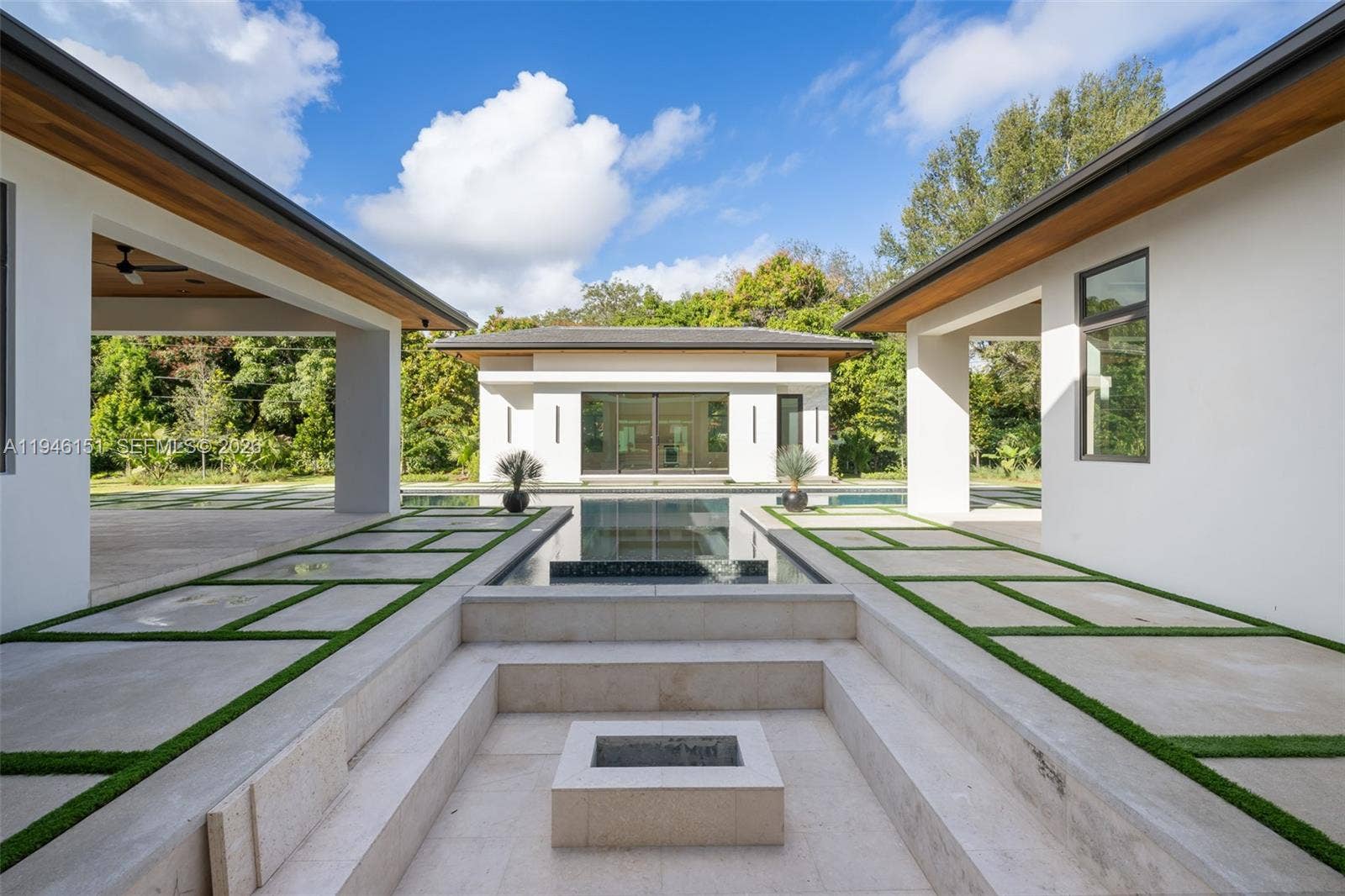 7725 SW 114th Street, Pinecrest, FL 33156 Built in Seating area with Gas Fireplace