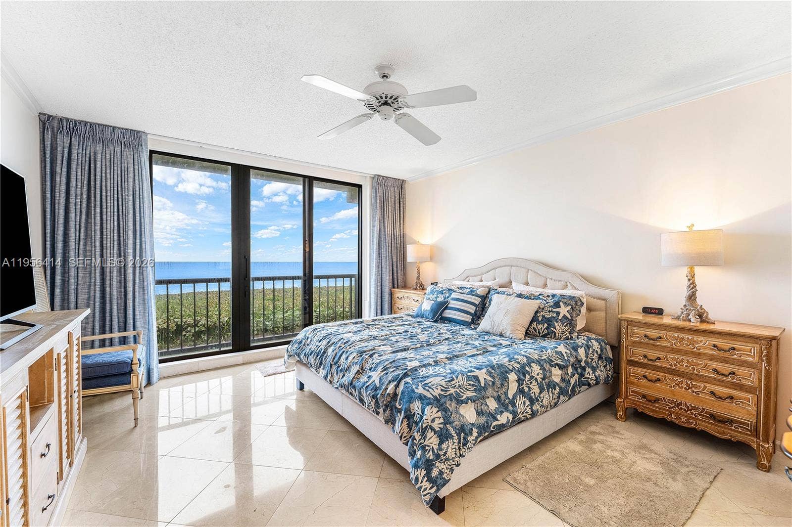 With balcony overlooking the ocean