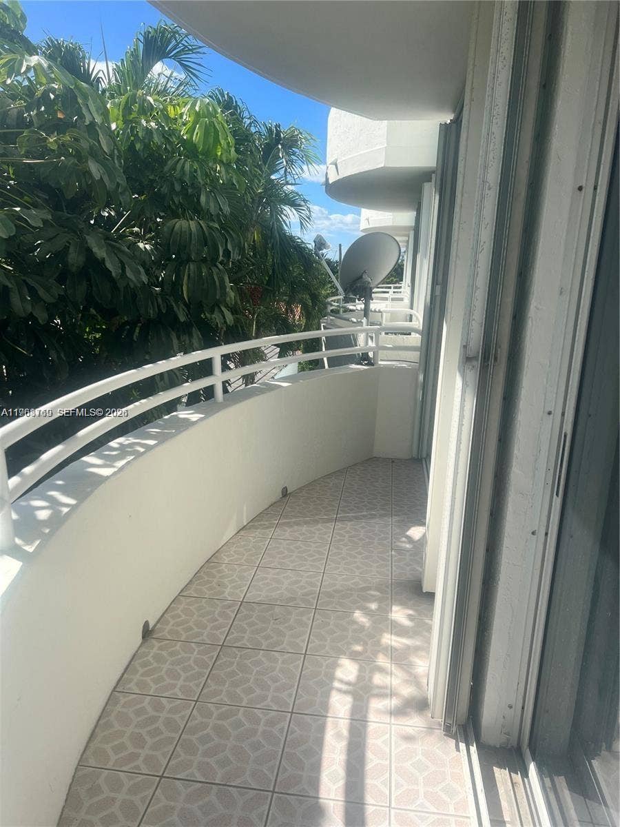 9156 Collins Avenue, #204, Surfside, Surfside, FL 33154 Bedroom and living room with Balcony.