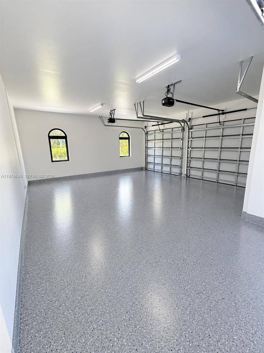 garage will have epoxy floor. AI staged.