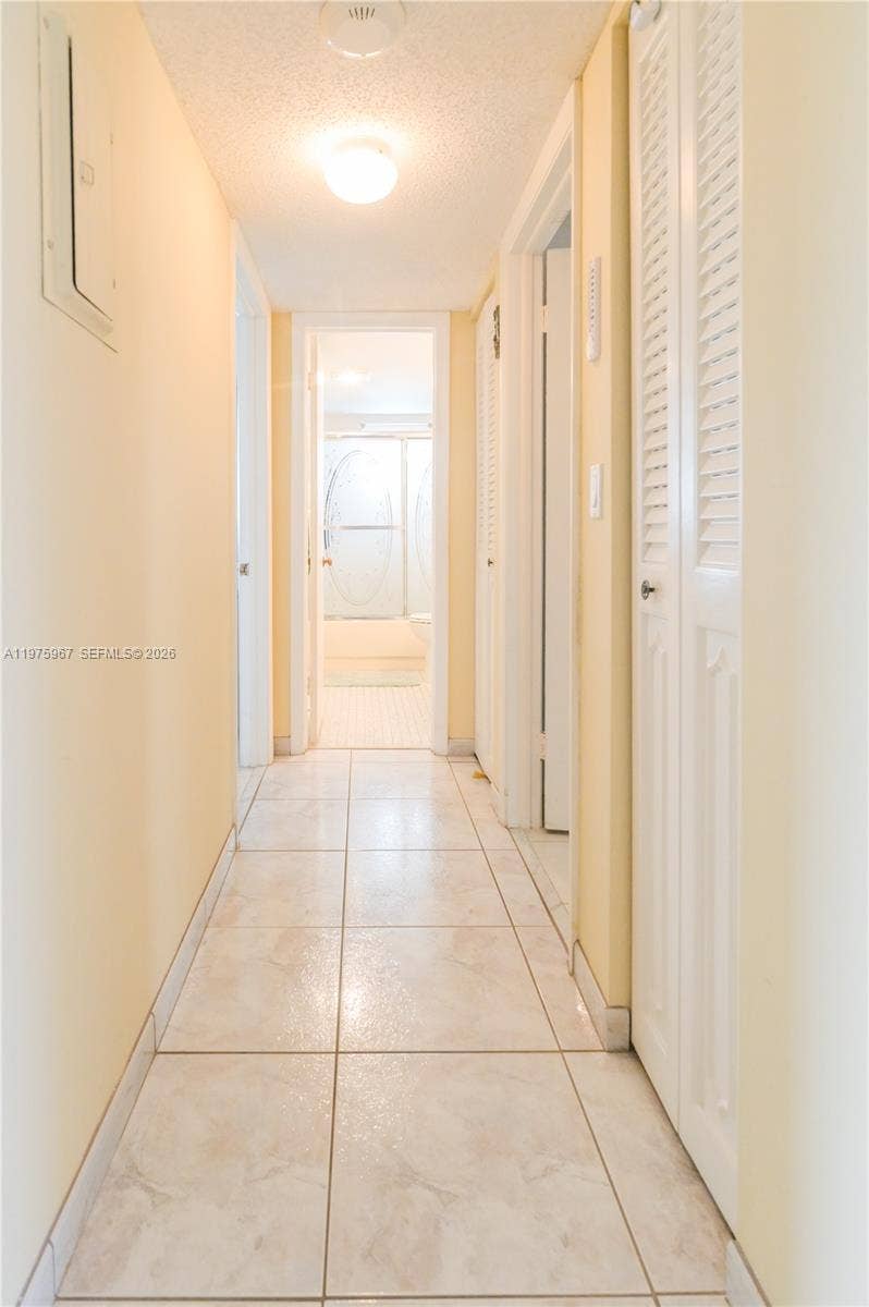 Hallway with closets