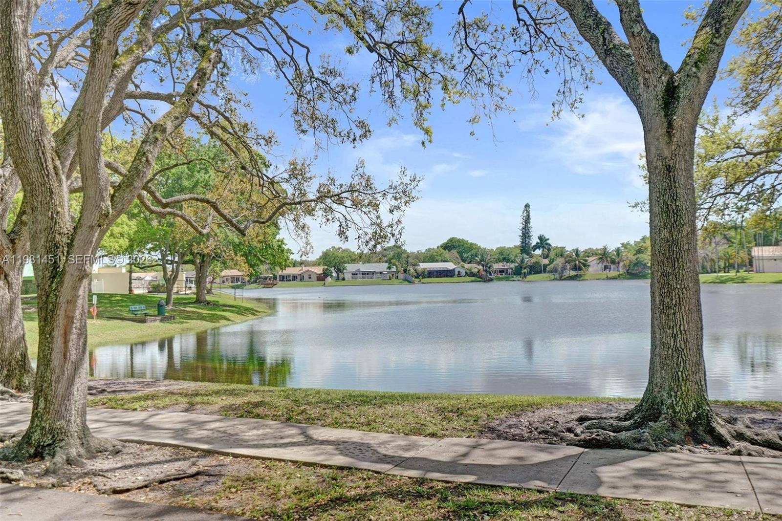 11585 N Quayside Drive, Cooper City, FL 33026 Tree-lined walking paths with beautiful views throughout Rock Creek Grounds