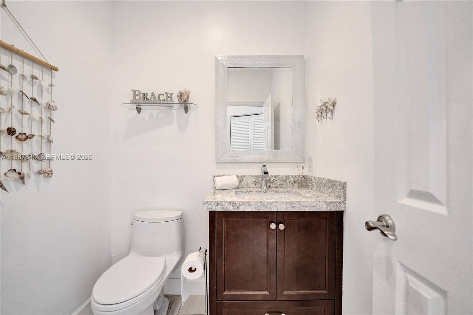 484 Cambridge Drive, Weston, FL 33326 Half bathroom downstairs