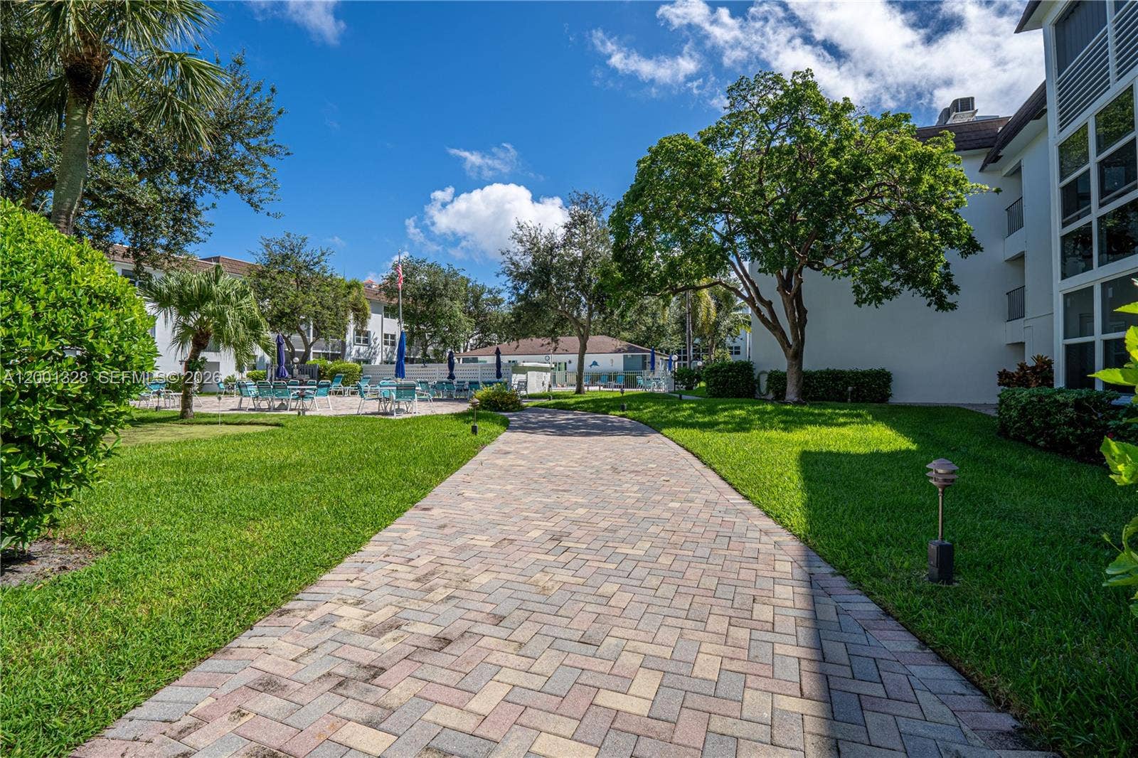 1501 S Ocean Boulevard, #117, Lauderdale By The Sea, FL 33062 Walk to the pool down this beautiful path.