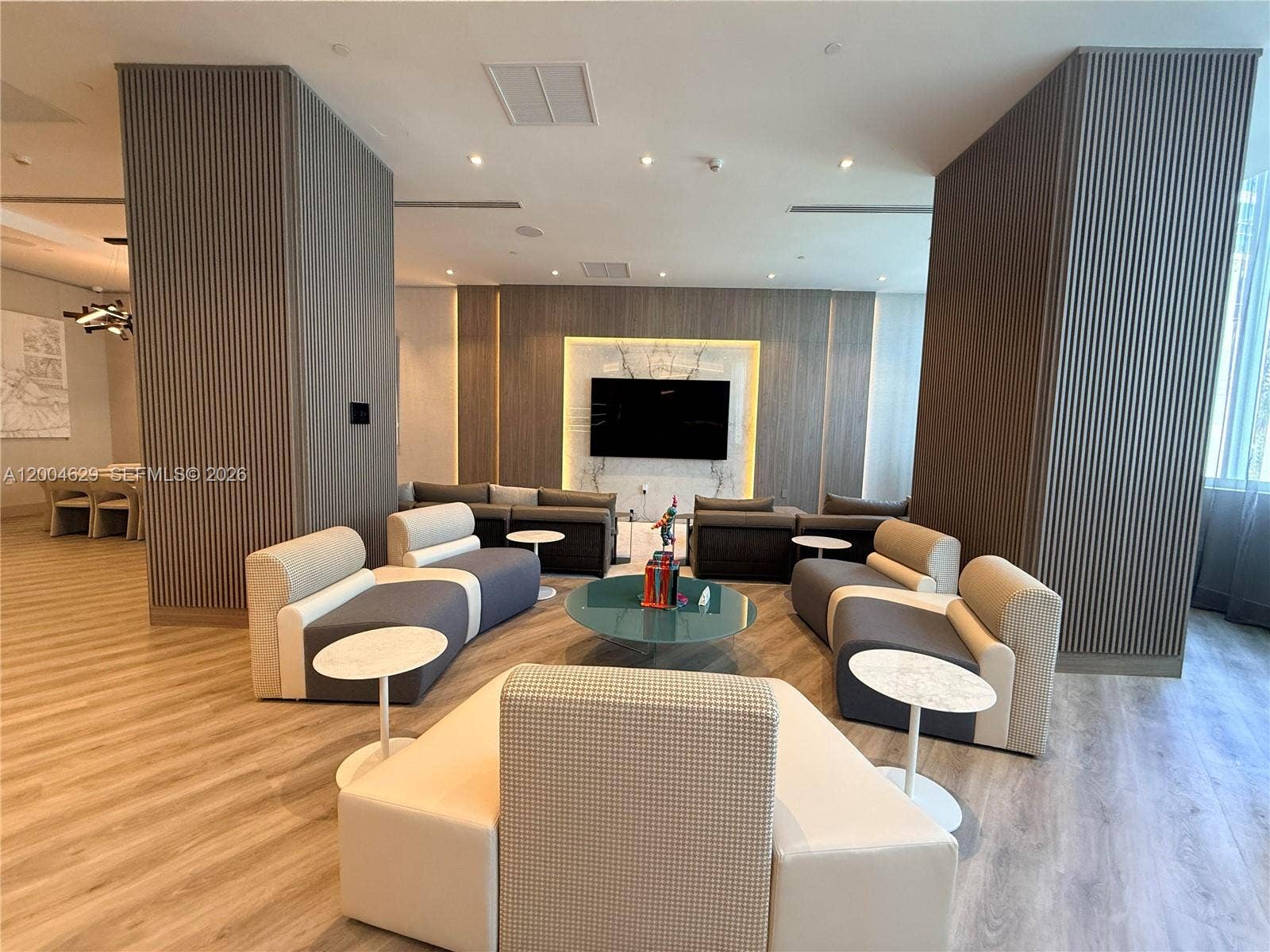 333 Las Olas Way, #304, Fort Lauderdale, FL 33301 Relax in the stylish TV lounge, designed for comfort and entertainment.