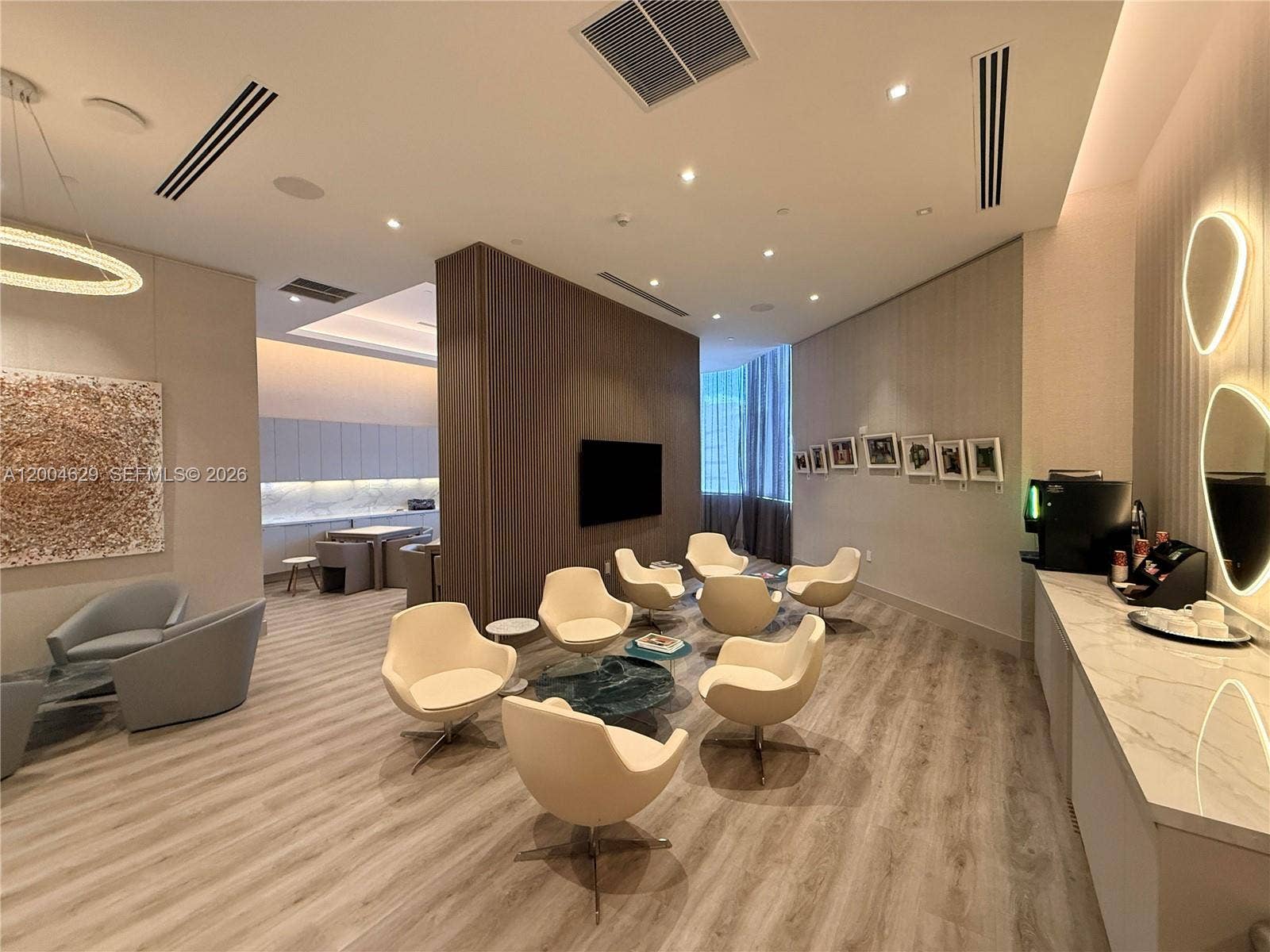 333 Las Olas Way, #304, Fort Lauderdale, FL 33301 Delight in the cozy caf area, a perfect spot for morning coffee or casual gatherings with friends.