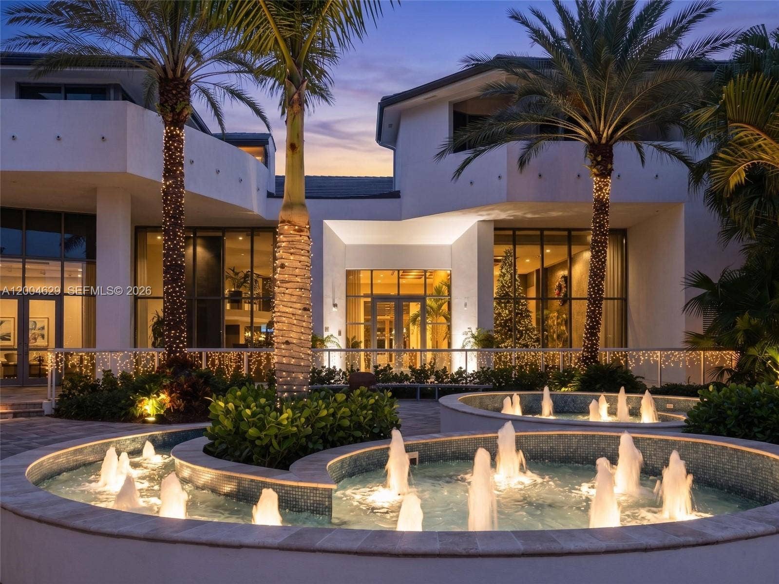 333 Las Olas Way, #304, Fort Lauderdale, FL 33301 This elegantly illuminated fountain located behind the terrace wall and in front of the New River transforms the night, with water cascading gracefully under the soft glow. Enjoy tranquil evenings by this stunning center piece, where every drop glistens like a gen in the moonlight.