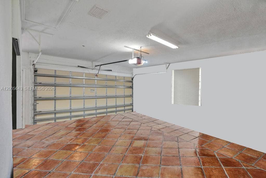 4981 SW 186th Avenue, Southwest Ranches, FL 33332 Air conditioned Garage fits 2 cars & 2 motorcycles cars removed virtually