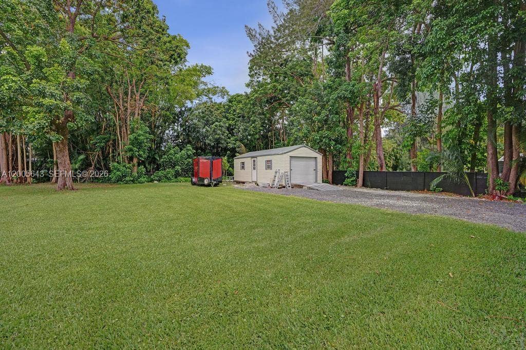4981 SW 186th Avenue, Southwest Ranches, FL 33332 Insulated, paneled shed equiped with power