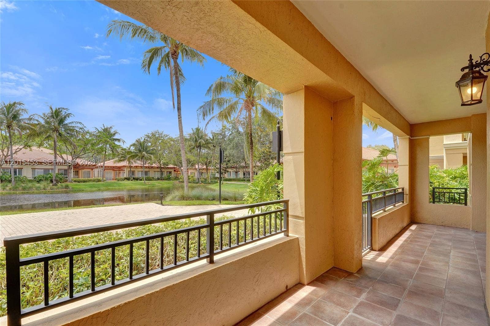16135 Emerald Estates Drive, #166, Weston, FL 33331 overlooking the lake