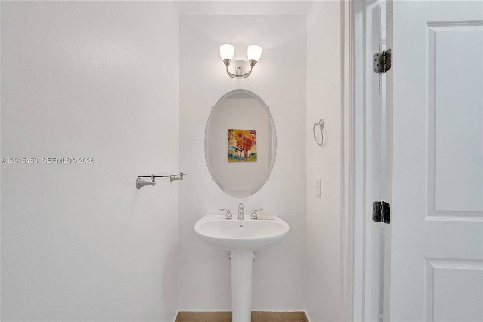 16135 Emerald Estates Drive, #166, Weston, FL 33331 Half bath near Foyer