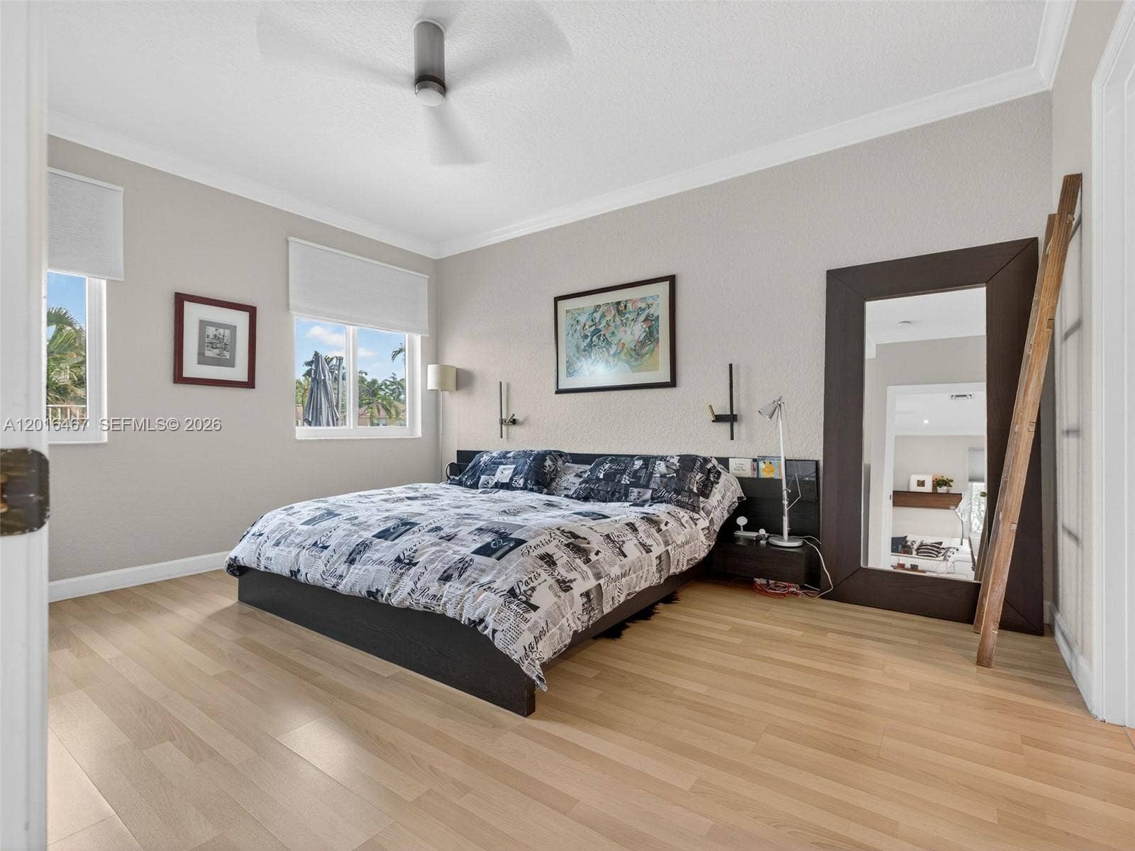 Large Primary Bedroom, overlooking pool and lake.