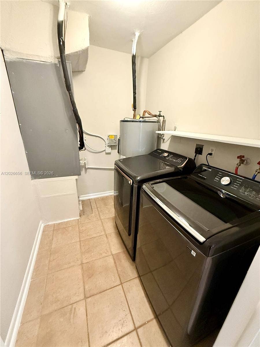 206 SE 3rd Place, Dania, Dania Beach, FL 33004 Spacious laundry room with new washer and dryer