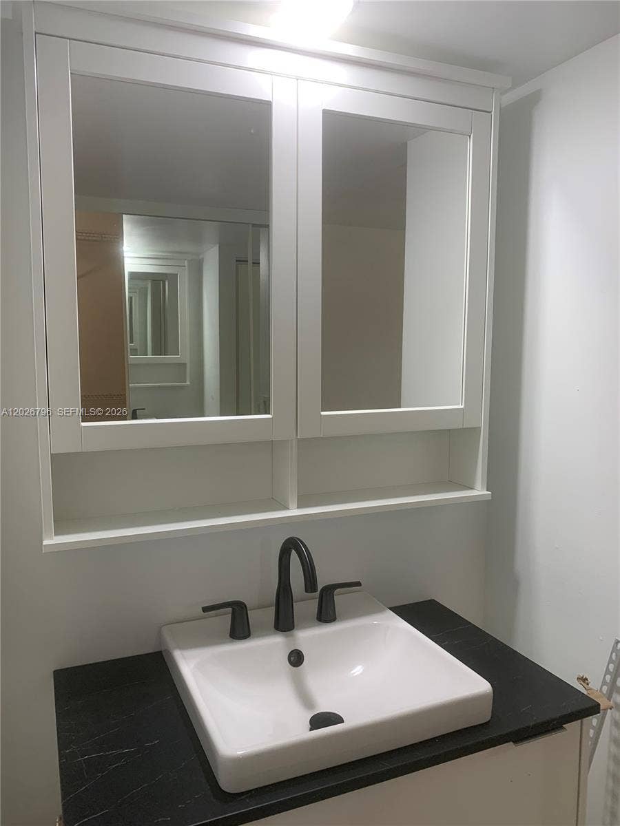 1705 Whitehall Drive, #304, Davie, Davie, FL 33324 Primary Bathroom Brand New Cabinet, Sink, Mirror and Lighting