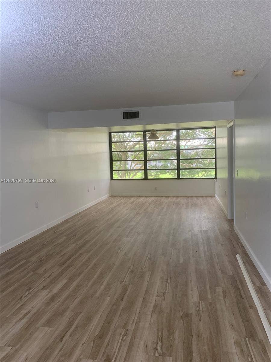 1705 Whitehall Drive, #304, Davie, Davie, FL 33324 Unstaged Living Room