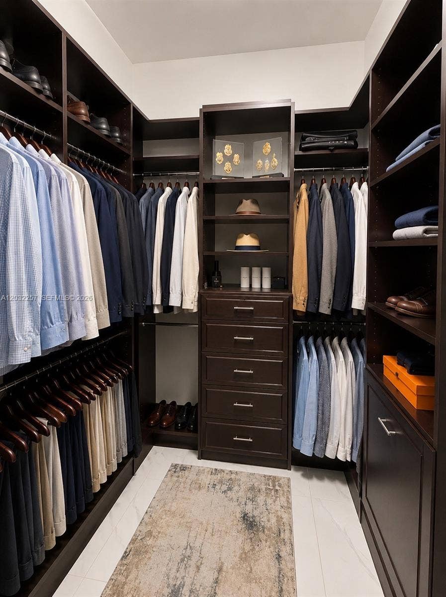 PRIMARY BEDROOM WALK IN CLOSET