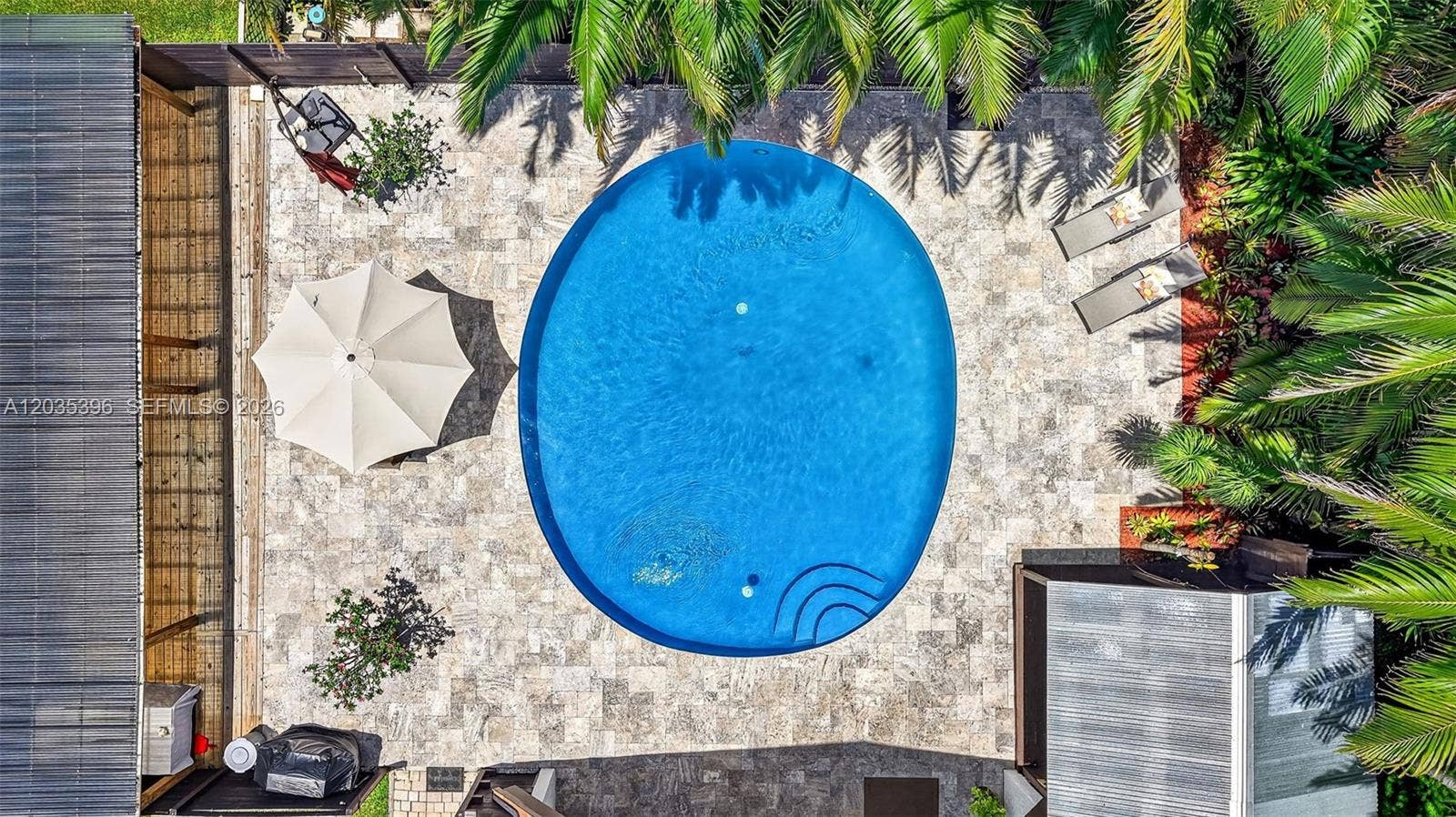 Travertine Deck surrounding beautiful large pool