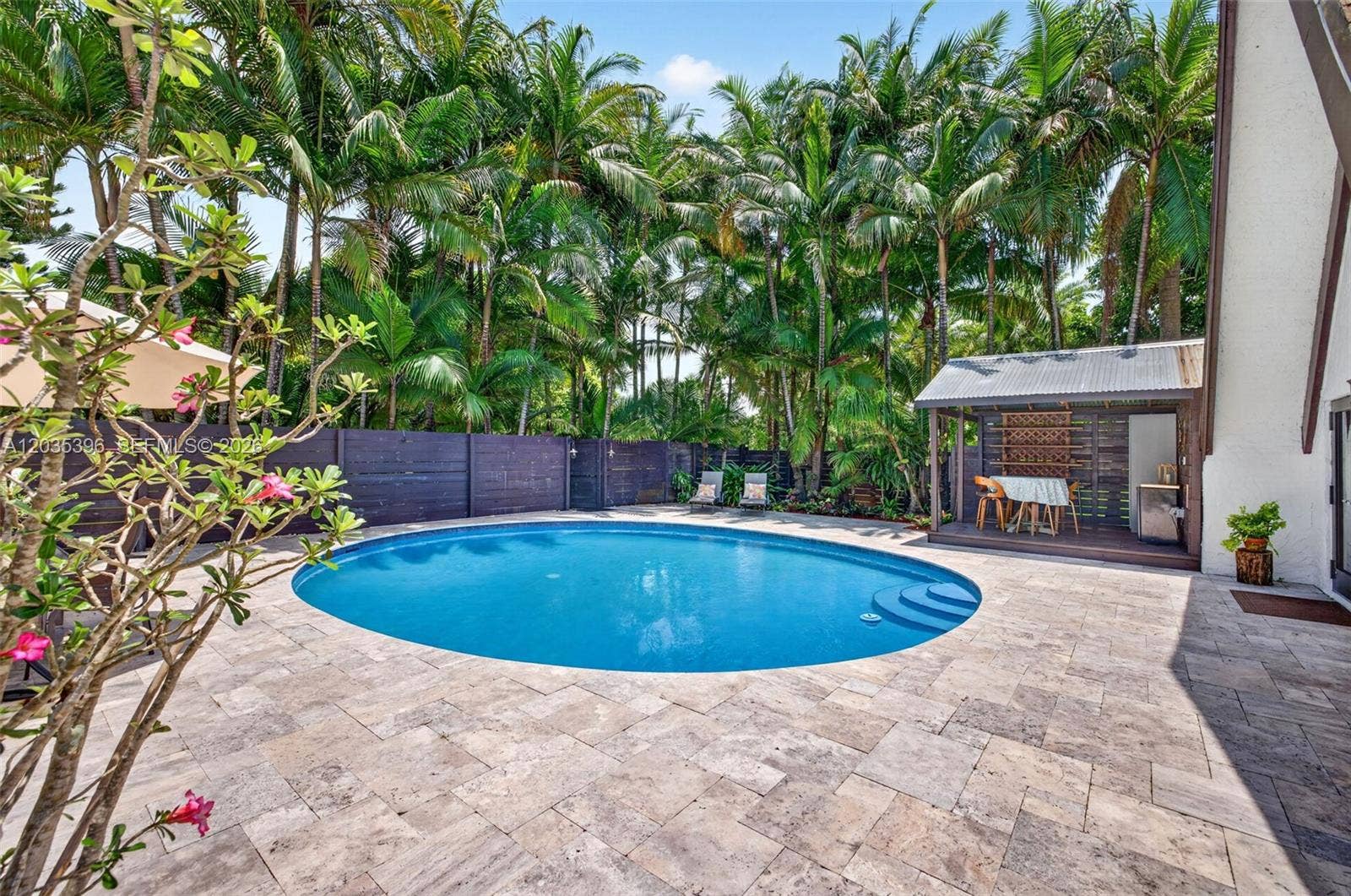 Travertine Deck surrounding beautiful large pool