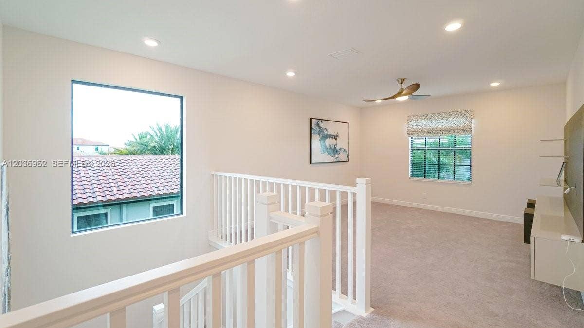 8725 Parkland Bay Drive, Parkland, FL 33076 upstairs hallway