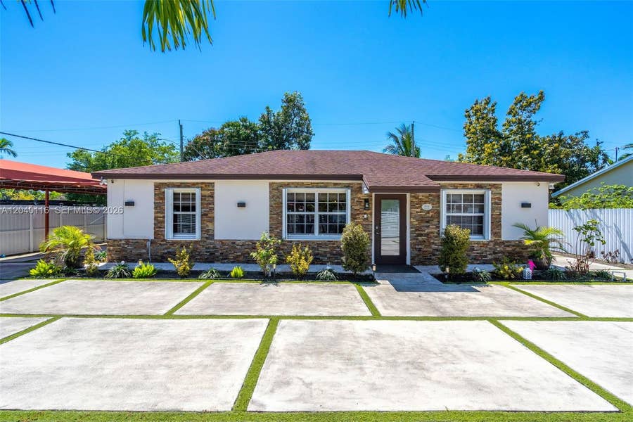 Property photo for 302 NW 100th Street, Miami, FL