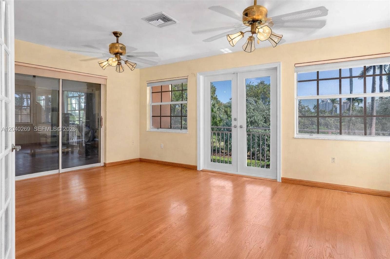 5309 Alton Road, Miami Beach, FL 33140 The second floor-Private sitting area off the primary suite with balcony access and exercise room