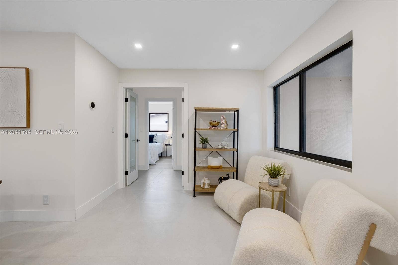 Interior transition showcasing the residence's clean contemporary design.