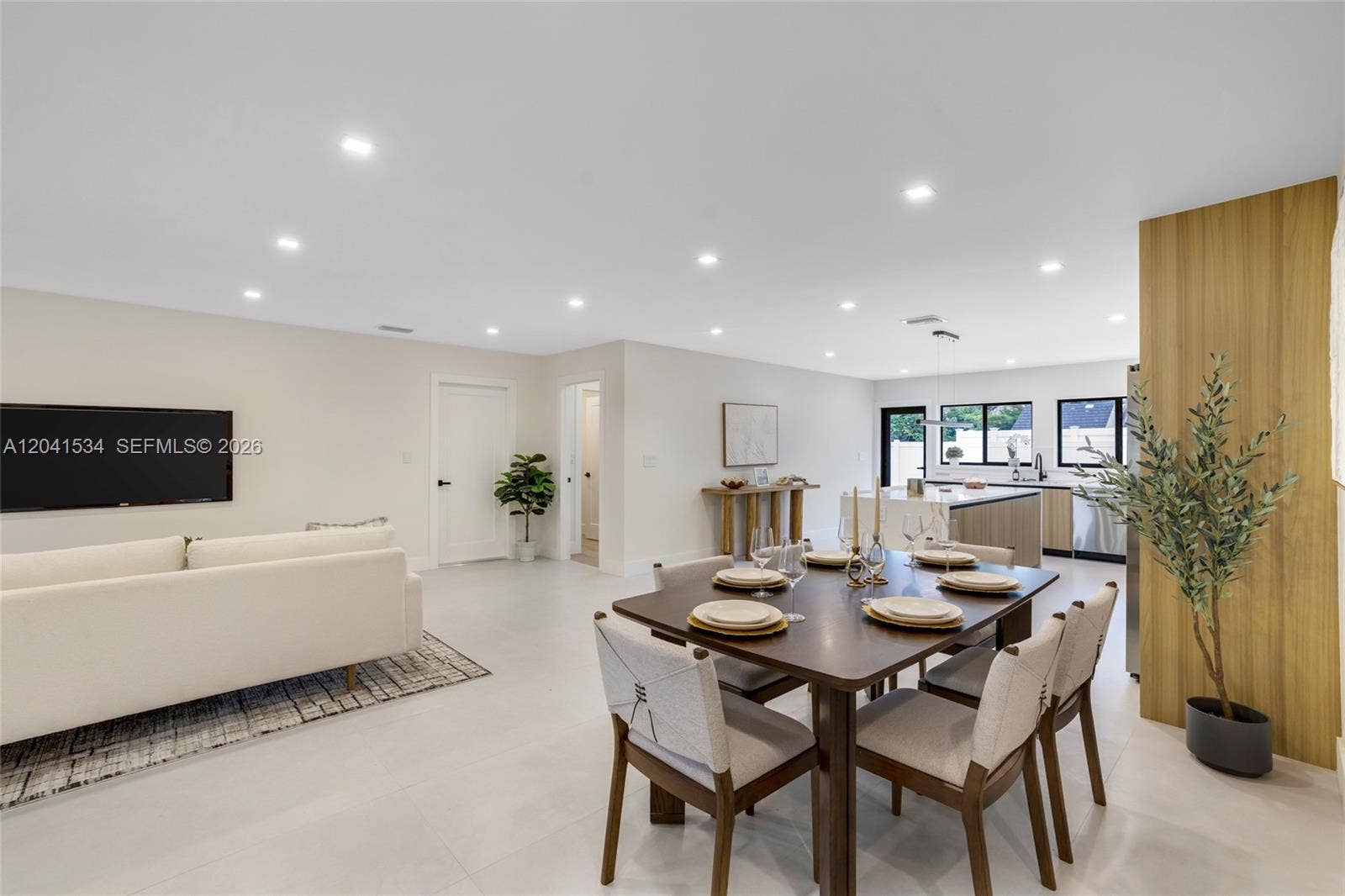 Open dining space connecting the kitchen and main living area.