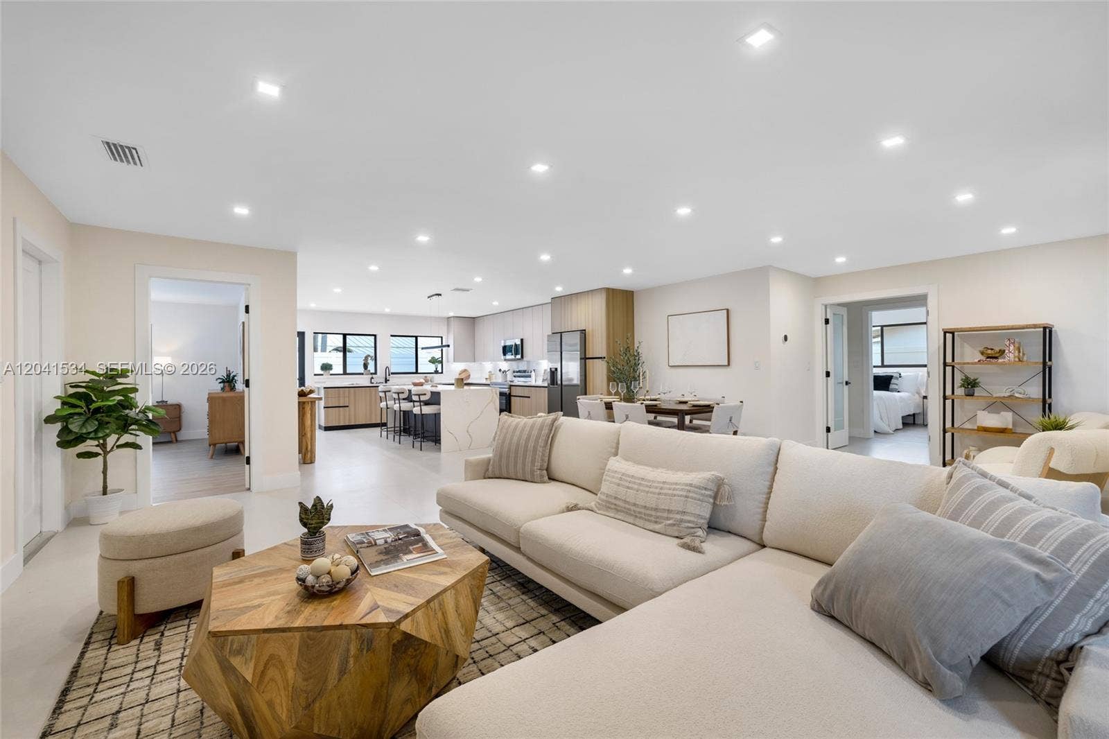 Expansive open living area within this renovated Fort Lauderdale residence.